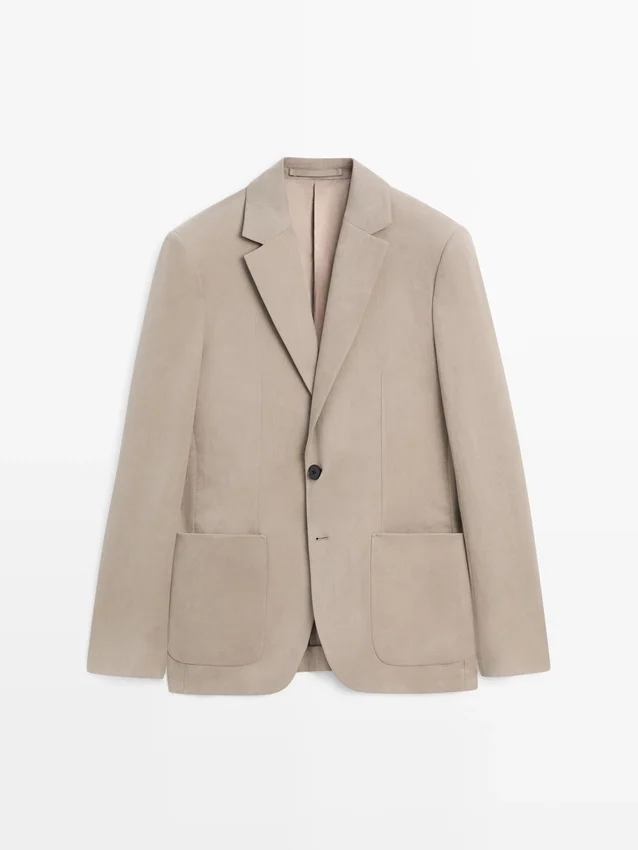 Maßgeschneiderter Leinen-Blazer mit Taschendetails Maßgeschneiderter Leinen-Blazer mit Taschendetails