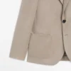 Maßgeschneiderter Leinen-Blazer mit Taschendetails Maßgeschneiderter Leinen-Blazer mit Taschendetails