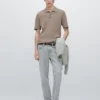 Poloshirt aus Baumwollmischung mit Zopfmuster Poloshirt aus Baumwollmischung mit Zopfmuster