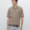 Poloshirt aus Baumwollmischung mit Zopfmuster Poloshirt aus Baumwollmischung mit Zopfmuster