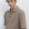 Poloshirt aus Baumwollmischung mit Zopfmuster Poloshirt aus Baumwollmischung mit Zopfmuster
